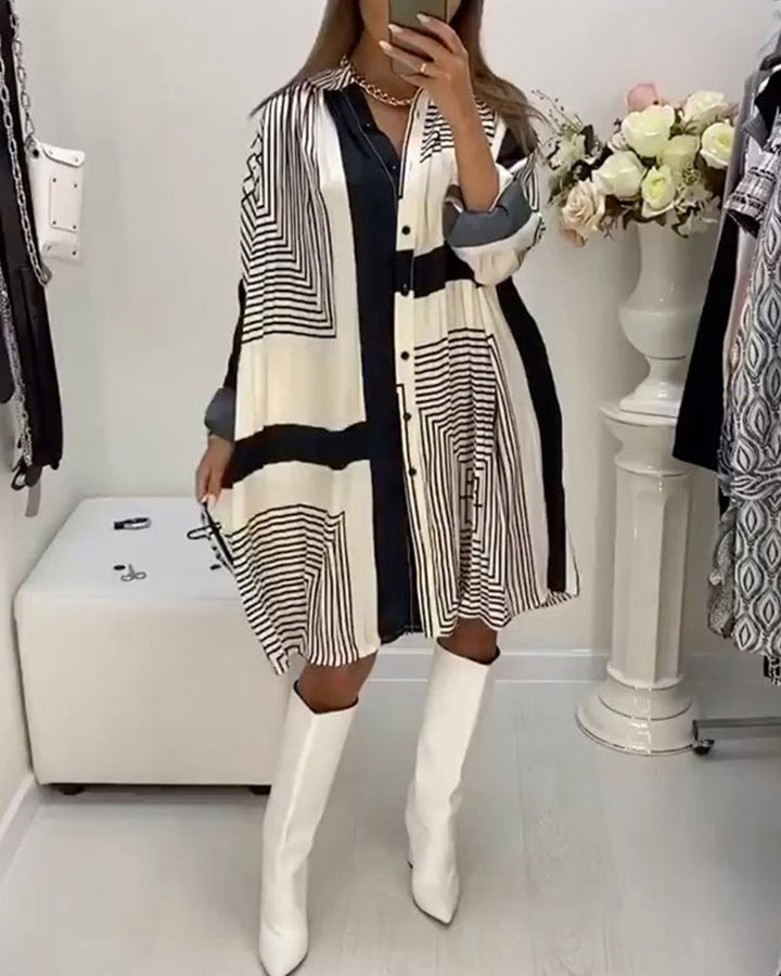Oversized kjole med knapper og print
